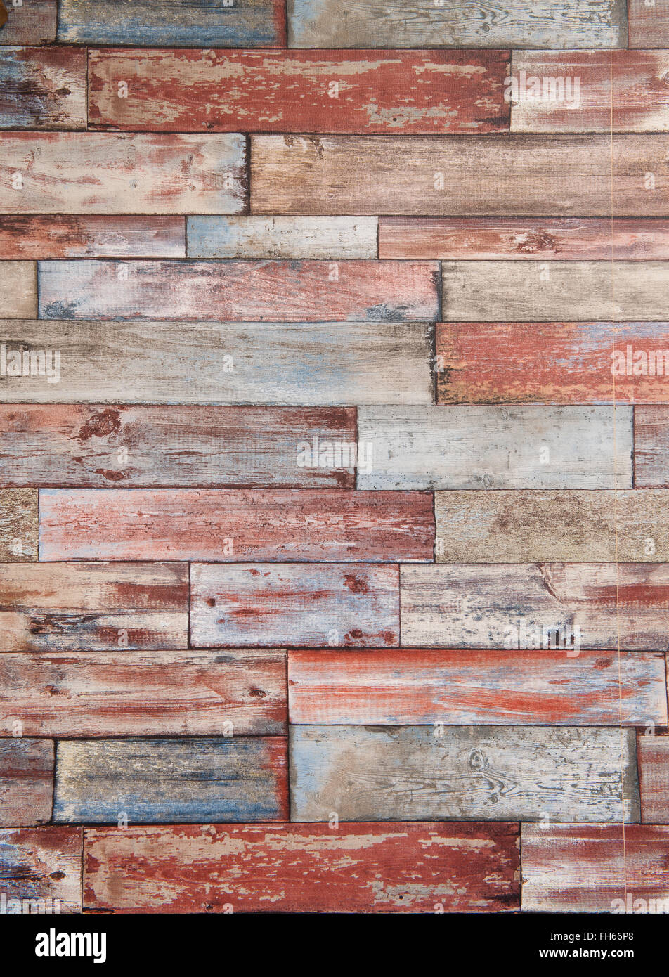 Vertical frame of colorful brick wall background with red blue and wooden look Stock Photo
