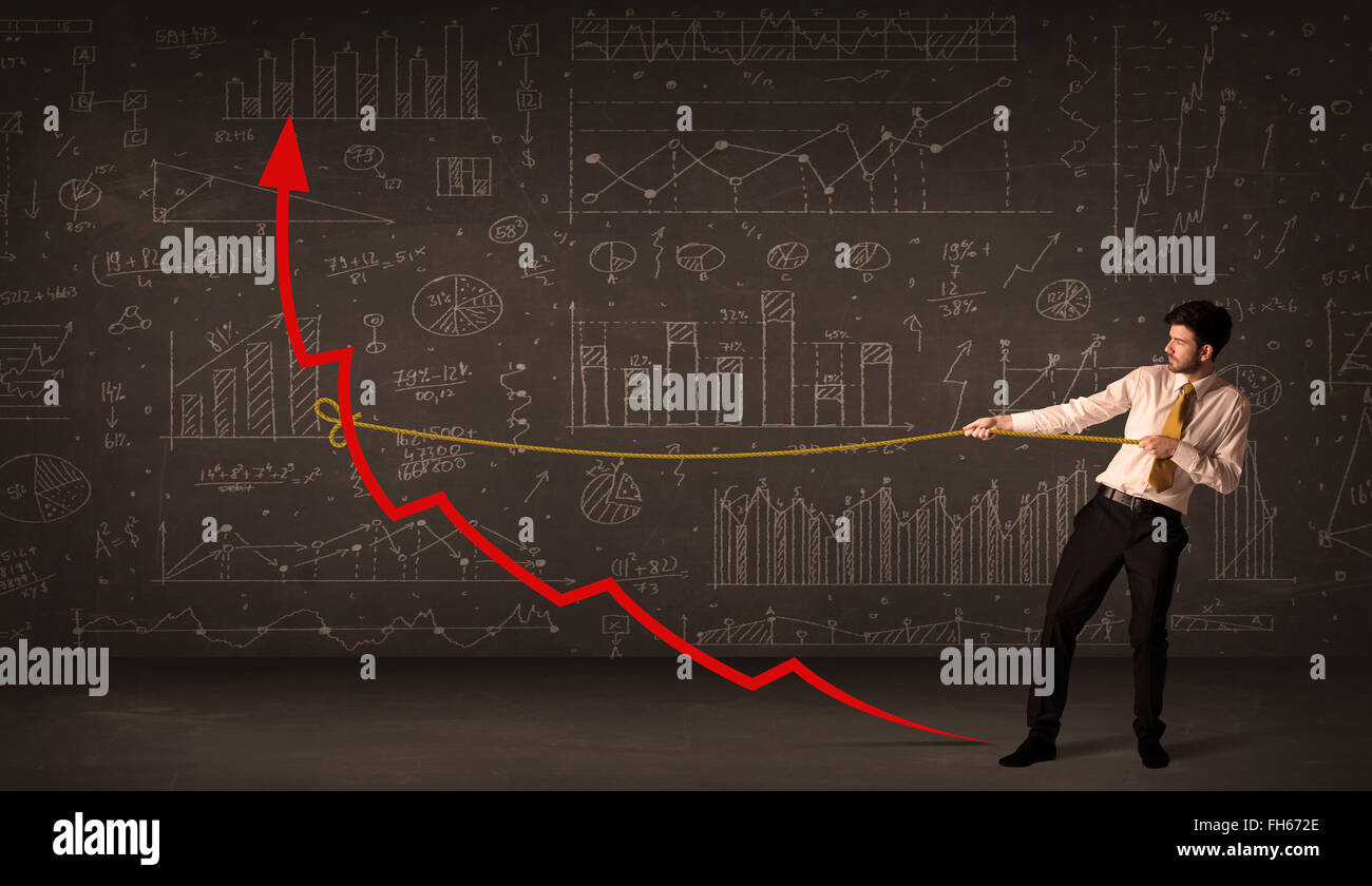 Businessman pulling a red arrow upright with a rope Stock Photo - Alamy