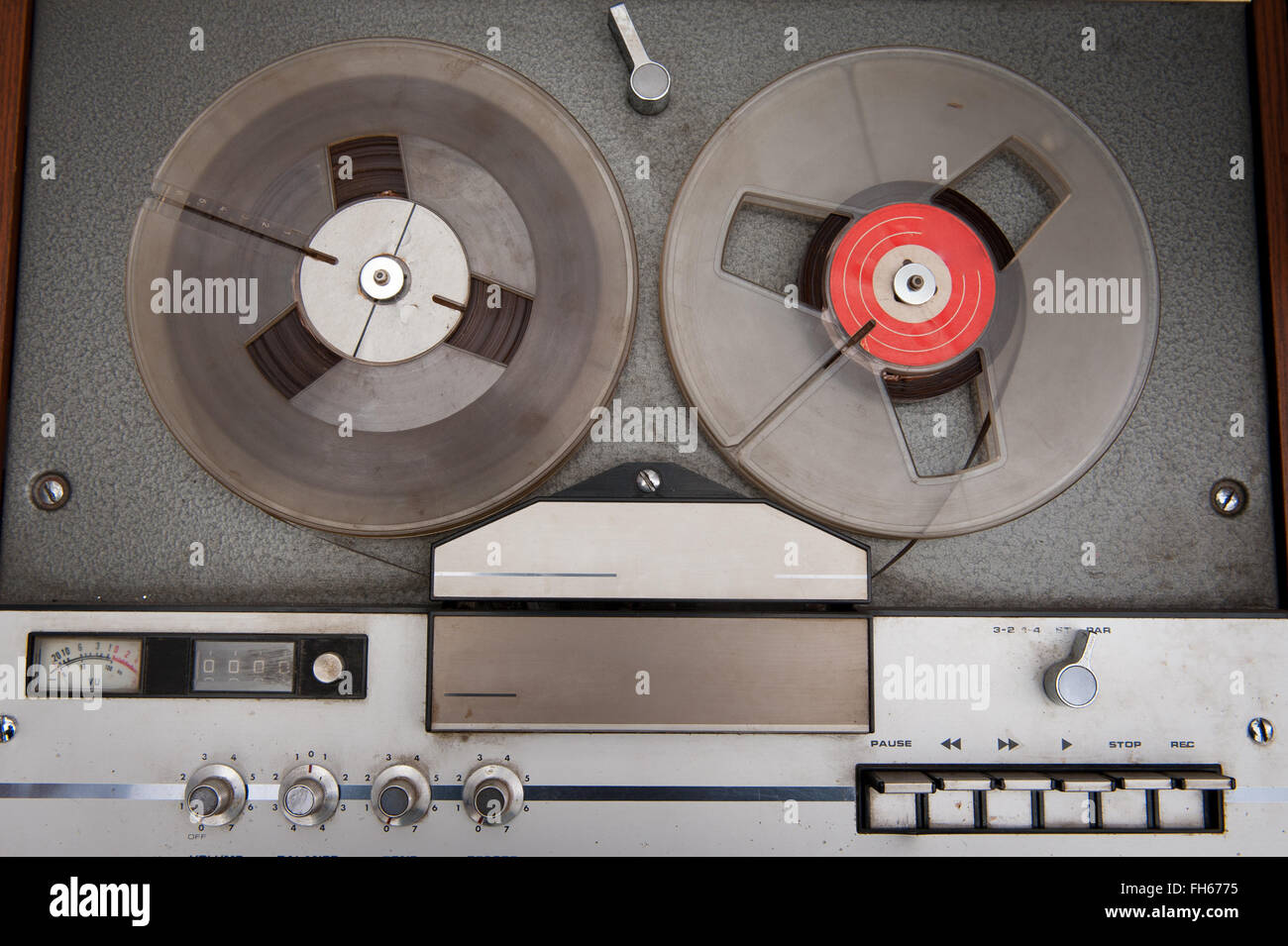 Old fashioned wooden reel to reel tape machine for recording sound