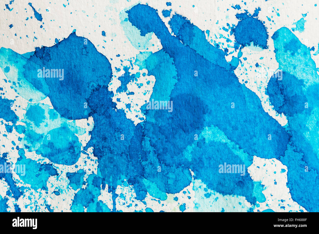 Watercolor blue abstract  with ink blots on white grainy paper. To use as  texture or background. Design element. Stock Photo