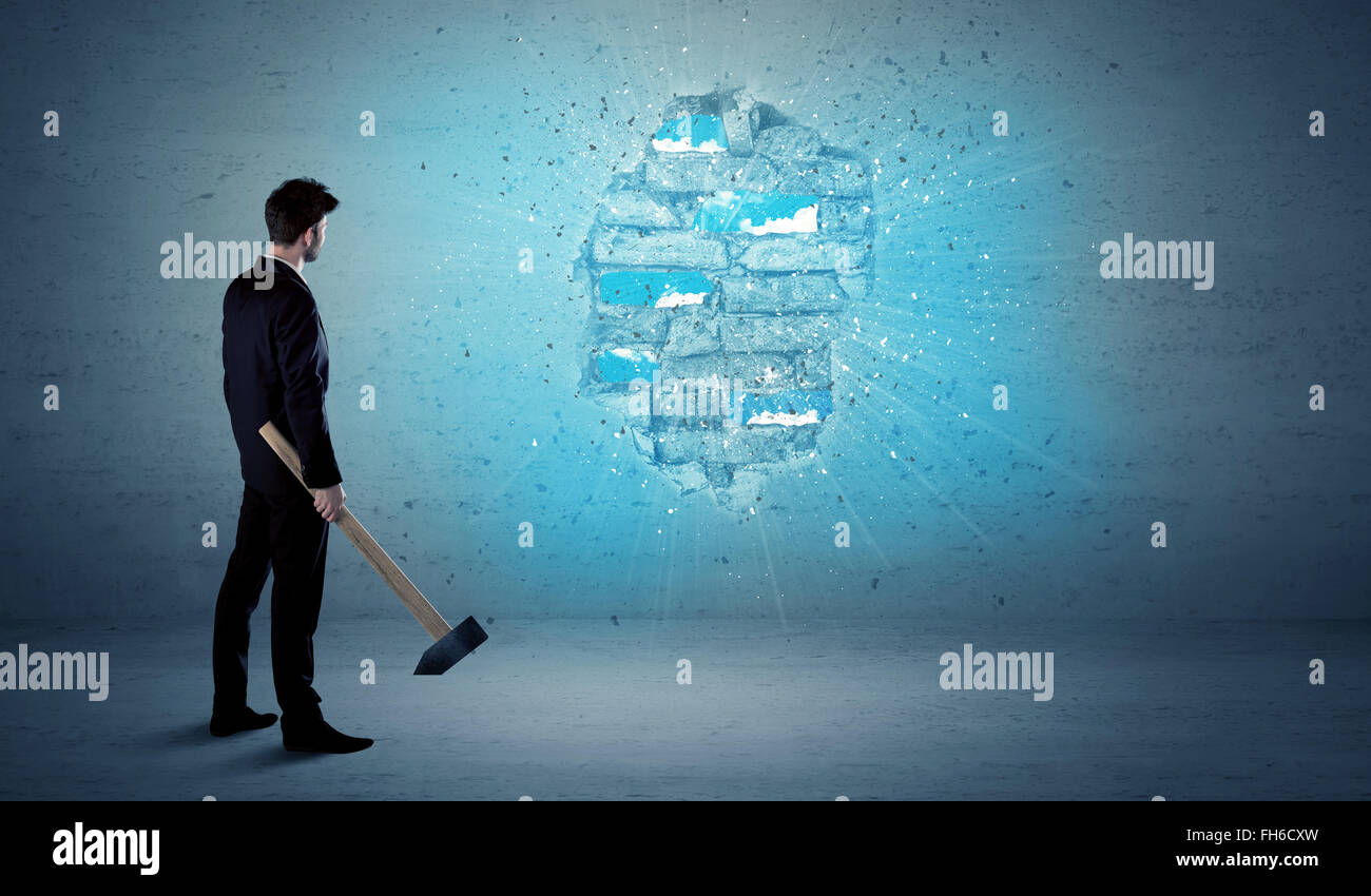 Business Man Hitting Brick Wall With Huge Hammer Stock Photo - Alamy