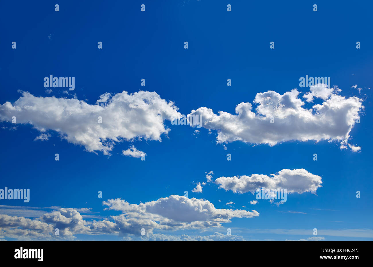Blue sky with clouds in a summer sunny day Stock Photo - Alamy