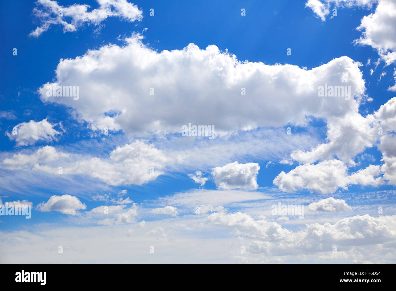 Blue sky with clouds in a summer sunny day Stock Photo - Alamy