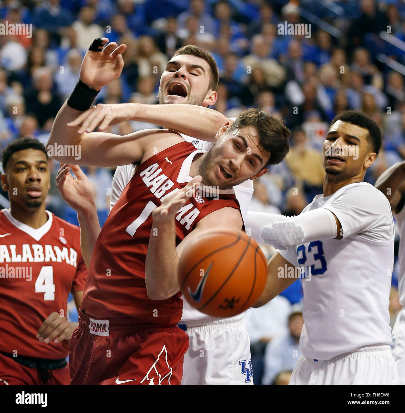 Lexington, KY, USA. 23rd Feb, 2016. Kentucky Wildcats forward Isaac Humphries (15) battled Alabama Crimson Tide forward Riley Norris (1) for a rebound as the University of Kentucky played the University of Alabama in Rupp Arena in Lexington, Ky., Tuesday, February 23 2016. This is first half mens basketball action. © Lexington Herald-Leader/ZUMA Wire/Alamy Live News Stock Photo