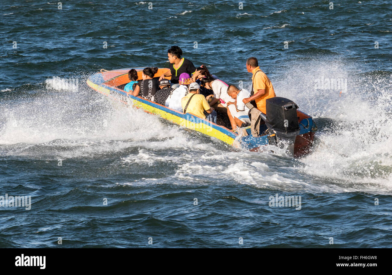Boats Going To And From The Island Around Kota Kinabalu Sabah Malaysia When The Sea Is Rough On An Otherwise Fine Day Stock Photo Alamy
