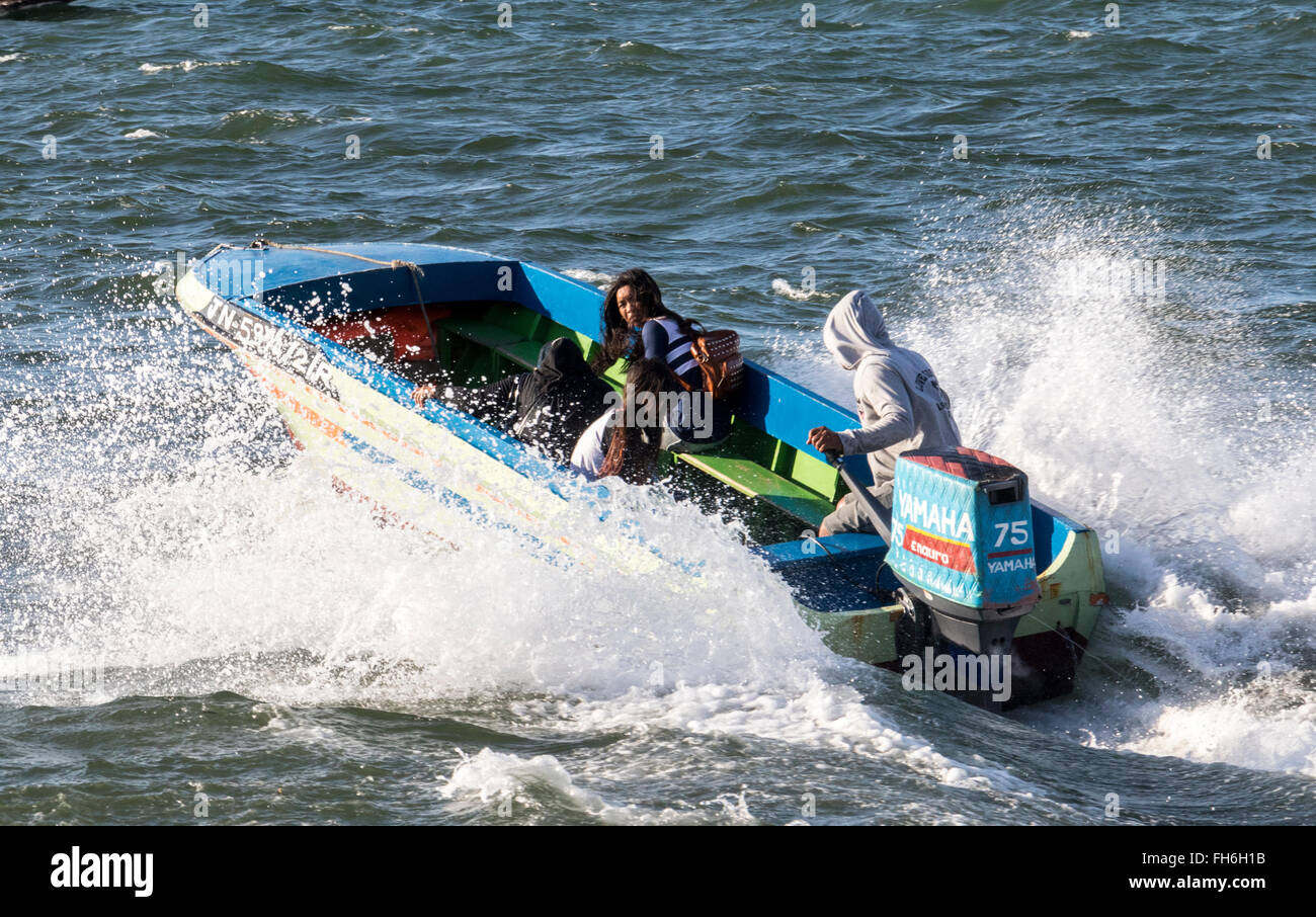 Boats Going To And From The Island Around Kota Kinabalu Sabah Malaysia When The Sea Is Rough On An Otherwise Fine Day Stock Photo Alamy