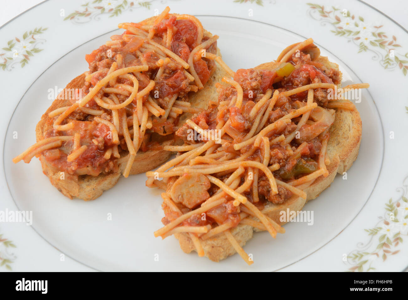 Open faced spaghetti sandwich with whole whet pasta and whole wheat bread Stock Photo