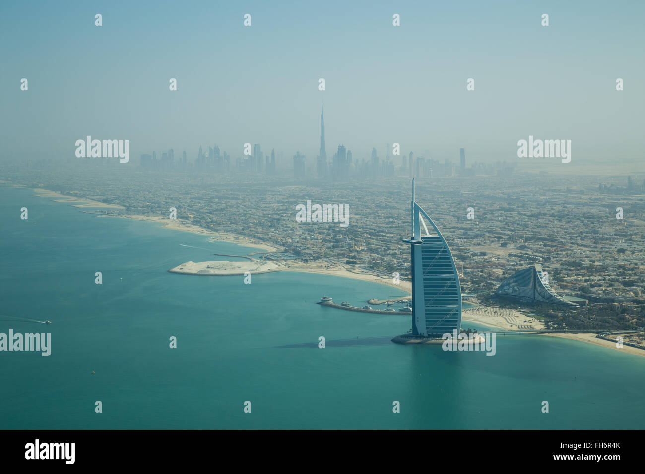 Dubai, United Arab Emirates - October 17, 2014: Photograph of the famous Burj Al Arab hotel in Dubai taken from a seaplane. Stock Photo