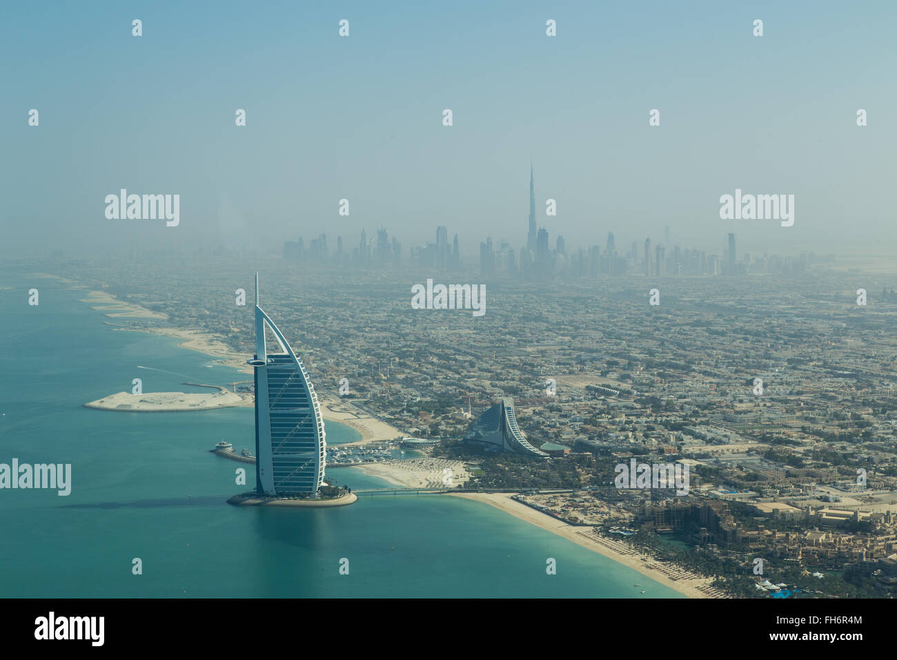 Dubai, United Arab Emirates - October 17, 2014: Photograph of the famous Burj Al Arab hotel in Dubai taken from a seaplane. Stock Photo