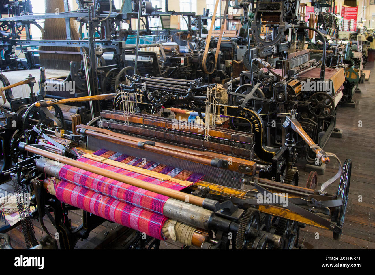 Old Weaving looms and spinning machinery at Bradford Industrial Museum