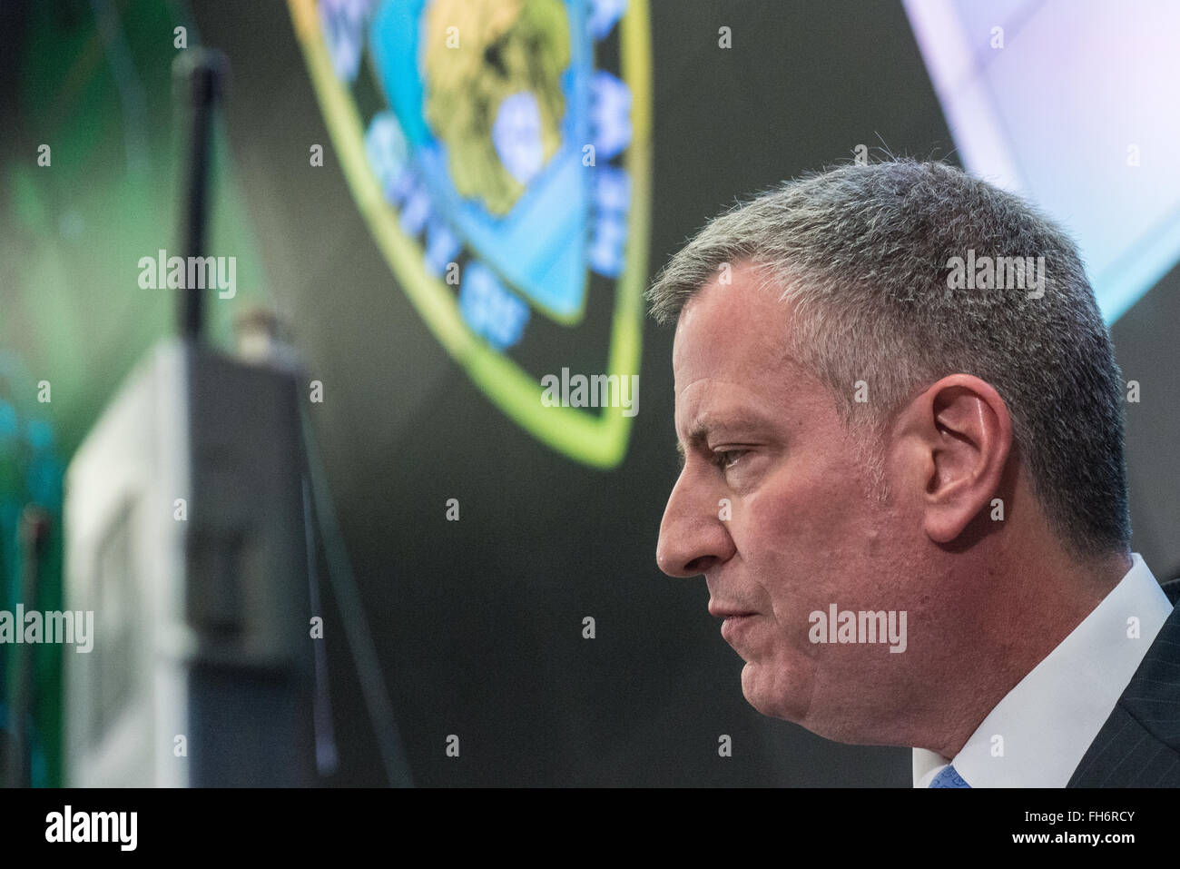New York, United States. 23rd Feb, 2016. Mayor de Blasio looks towards a member of the press as they ask a question. NYC Mayor Bill de Blasio and Police Commissioner William Bratton held a press briefing at One Police Plaza, the headquarters of the NYPD, to announce the launch of 'CompStat 2.0,' a new system for both publicly sharing crime data and enabling much accelerated distribution of vital police information resources among officers in the field. Credit:  Albin Lohr-Jones/Pacific Press/Alamy Live News Stock Photo