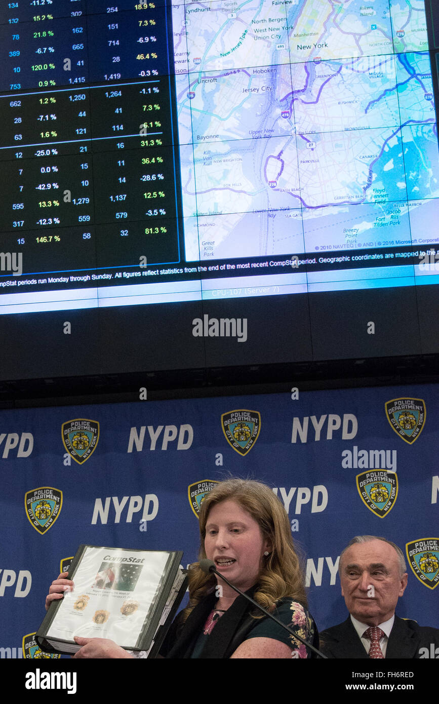 New York, United States. 23rd Feb, 2016. NYPD Deputy Commissioner of Information Technology Jessica Tisch holds aloft a copy of the the traditional 'CompStat' crime data binder. NYC Mayor Bill de Blasio and Police Commissioner William Bratton held a press briefing at One Police Plaza, the headquarters of the NYPD, to announce the launch of 'CompStat 2.0,' a new system for both publicly sharing crime data and enabling much accelerated distribution of vital police information resources among officers in the field. Credit:  Albin Lohr-Jones/Pacific Press/Alamy Live News Stock Photo