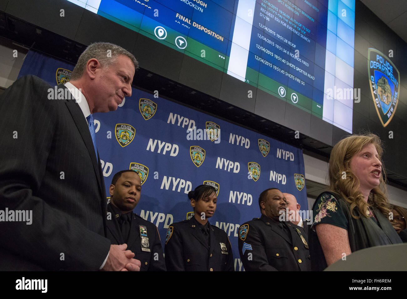 New York, United States. 23rd Feb, 2016. NYPD Deputy Commissioner of Information Technology Jessica Tisch (right) explains to the press one of the cases where officers used the new department-issued technology. NYC Mayor Bill de Blasio and Police Commissioner William Bratton held a press briefing at One Police Plaza, the headquarters of the NYPD, to announce the launch of 'CompStat 2.0,' a new system for both publicly sharing crime data and enabling much accelerated distribution of vital police information resources among officers in the field. Credit:  Albin Lohr-Jones/Pacific Press/Alamy Liv Stock Photo