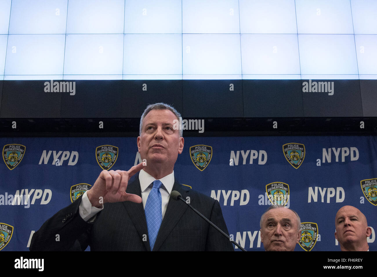 New York, United States. 23rd Feb, 2016. Mayor de Blasio (center left) speaks to the press. NYC Mayor Bill de Blasio and Police Commissioner William Bratton held a press briefing at One Police Plaza, the headquarters of the NYPD, to announce the launch of 'CompStat 2.0,' a new system for both publicly sharing crime data and enabling much accelerated distribution of vital police information resources among officers in the field. Credit:  Albin Lohr-Jones/Pacific Press/Alamy Live News Stock Photo