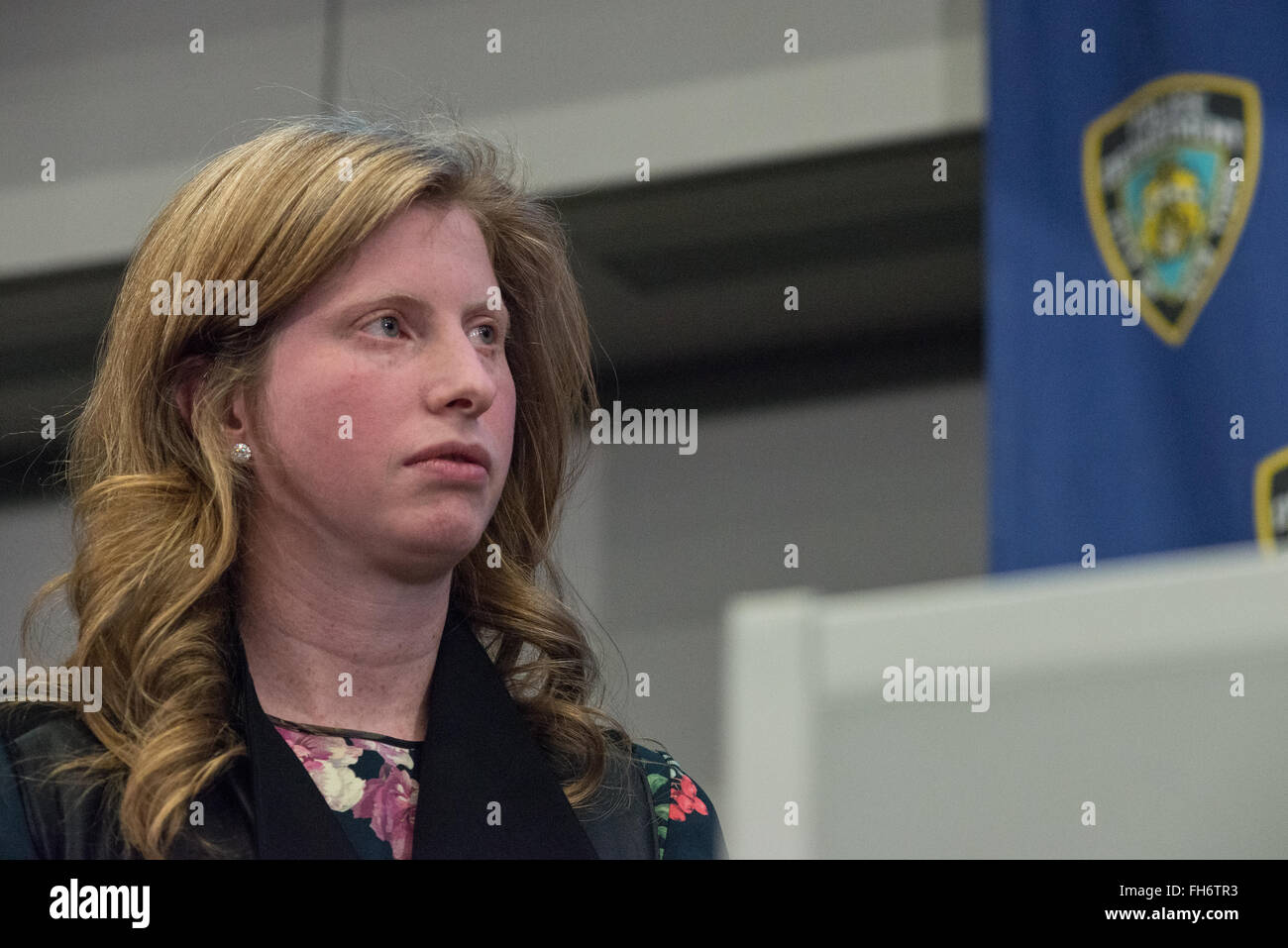 New York, United States. 23rd Feb, 2016. NYPD Deputy Commissioner of Information Technology Jessica Tisch listens as Mayor de Blasio offers his opening remarks. NYC Mayor Bill de Blasio and Police Commissioner William Bratton held a press briefing at One Police Plaza, the headquarters of the NYPD, to announce the launch of 'CompStat 2.0,' a new system for both publicly sharing crime data and enabling much accelerated distribution of vital police information resources among officers in the field. Credit:  Albin Lohr-Jones/Pacific Press/Alamy Live News Stock Photo