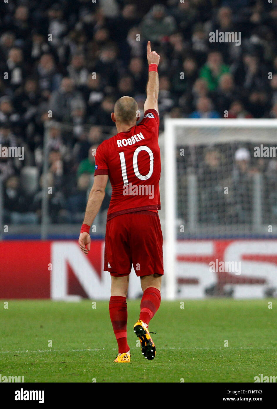 Bayern’s Arjen Robben celebrates after scoring during the Champions League first leg round of 16 football match between Juventus and Bayern at the Juventus Stadium. The game ended 2-2. (Photo by Riccardo de Luca / Pacific Press) Stock Photo