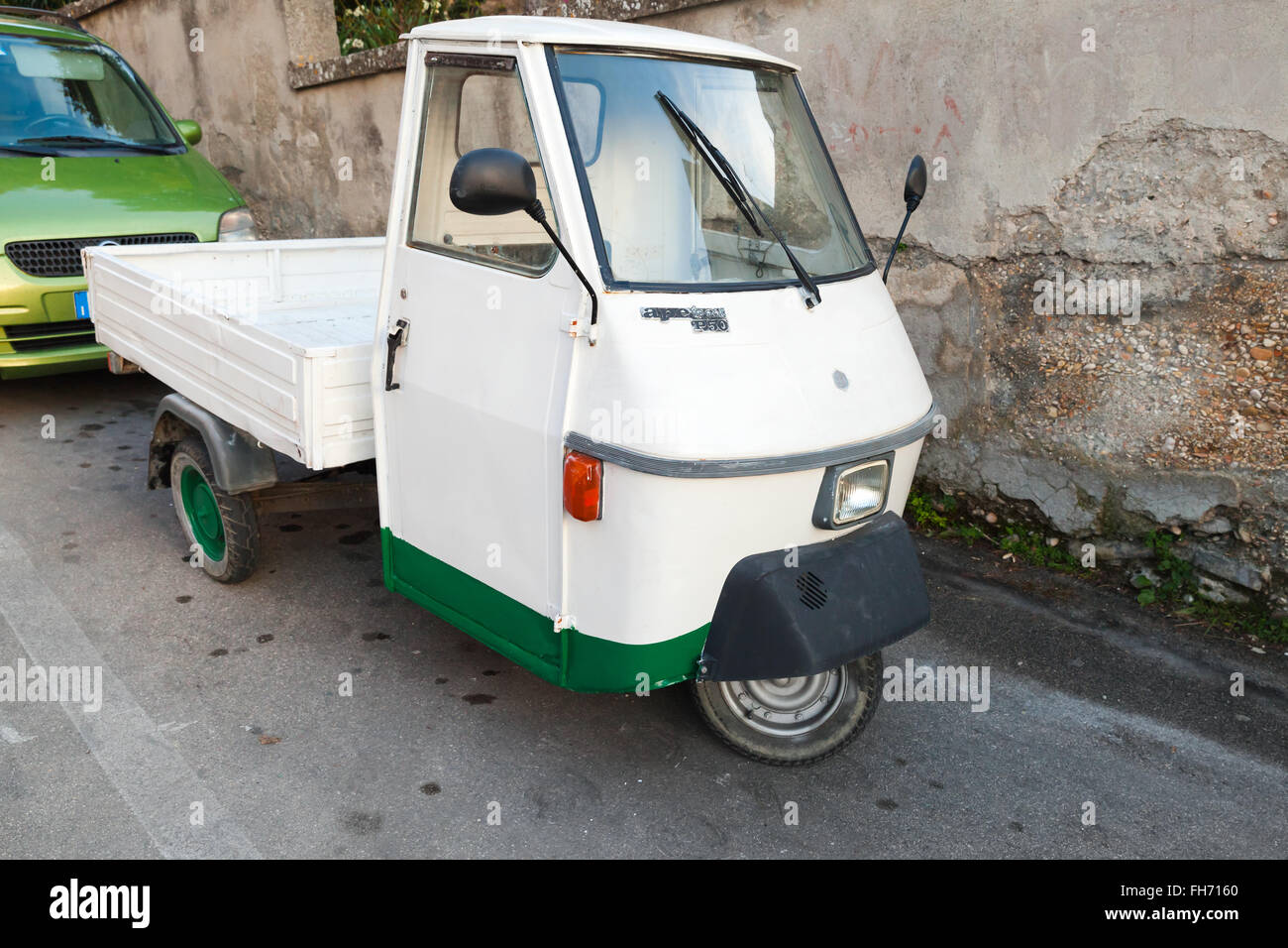 Fermo, Italy - February 8, 2016:  White Ape TM P 50 a three-wheeled light commercial vehicle produced since 1948 by Stock Photo