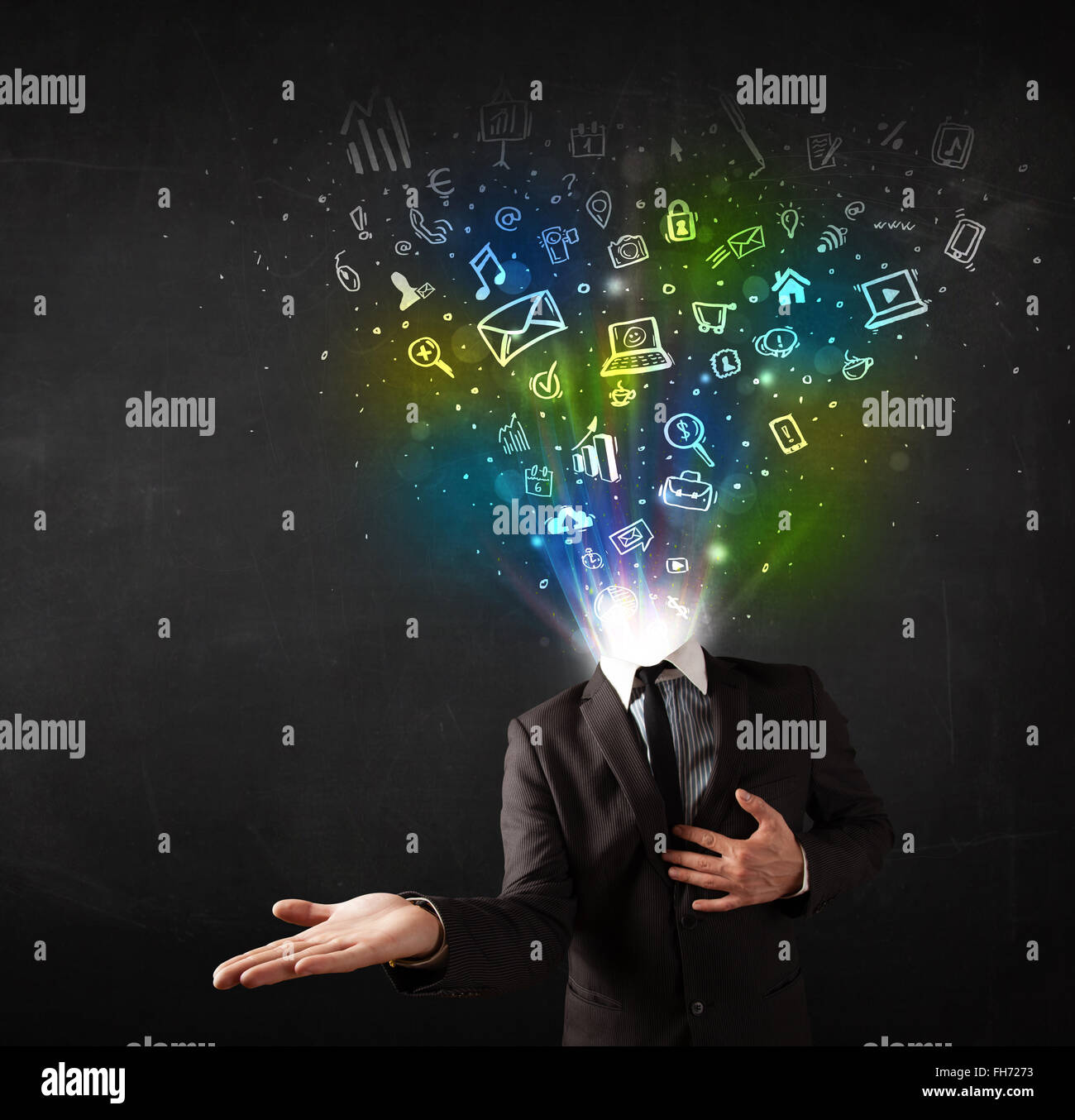 Business man with glowing media icons exploding head Stock Photo - Alamy