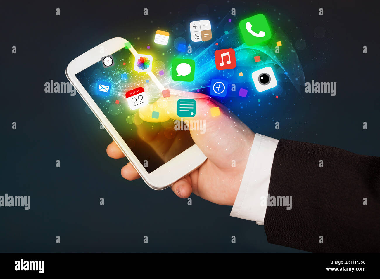 Hand holding smartphone with colorful app icons Stock Photo - Alamy