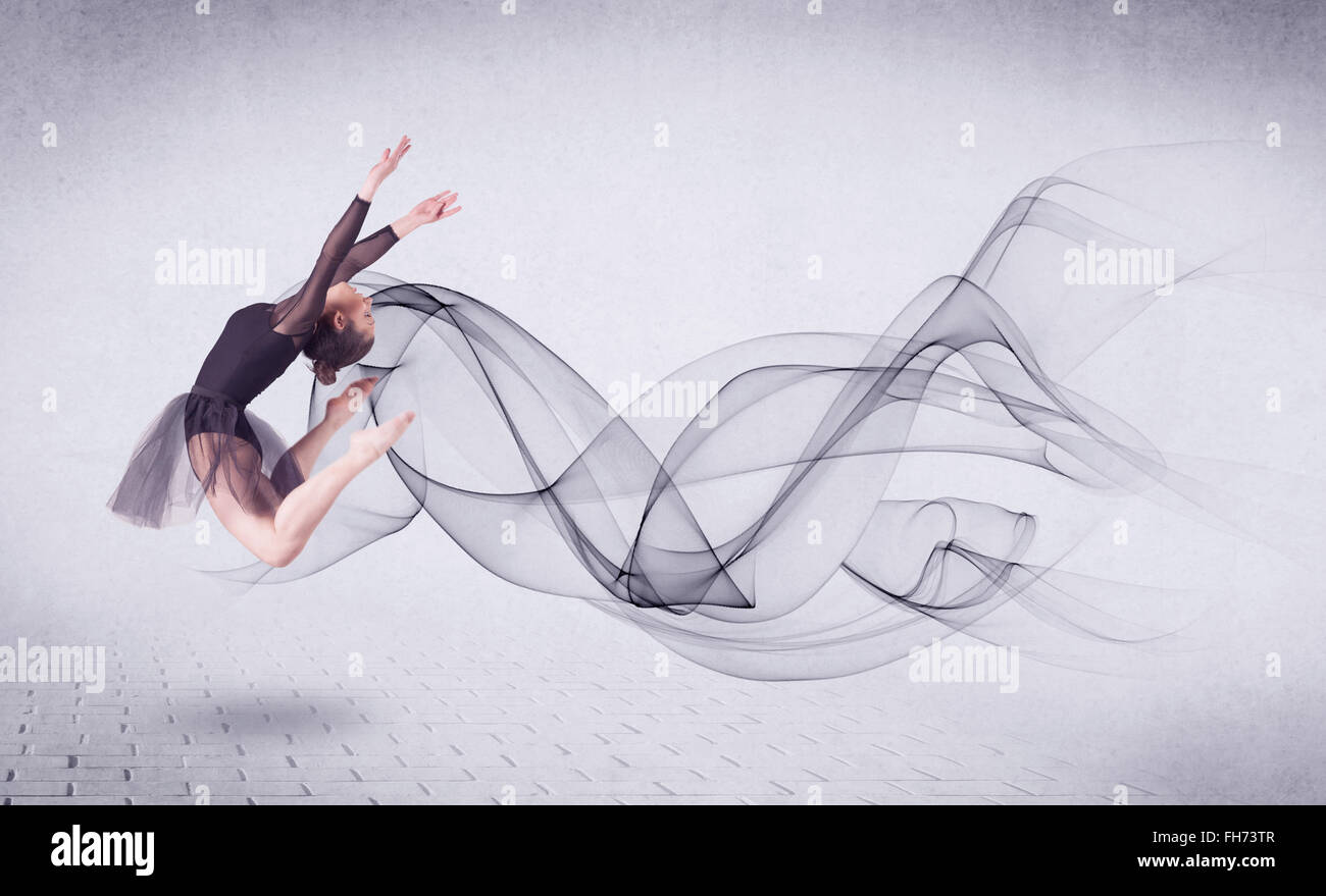 Modern ballet dancer performing with abstract swirl Stock Photo