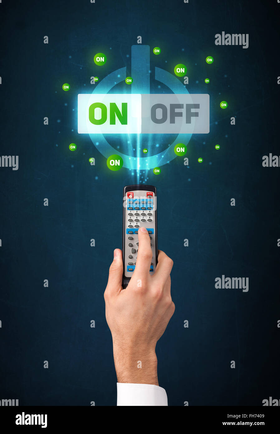Hand with remote control and onoff signals Stock Photo Alamy