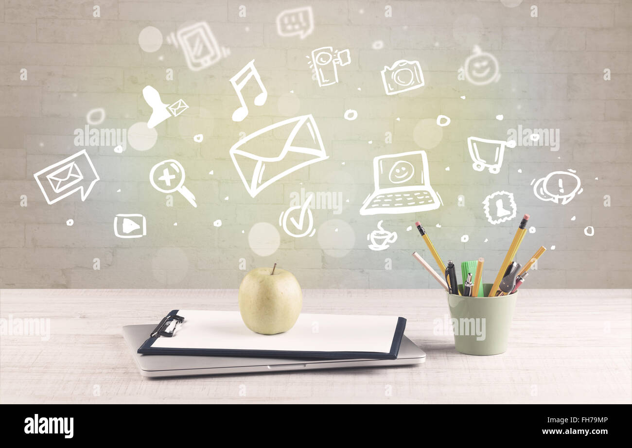 Office desk with communication icons Stock Photo - Alamy