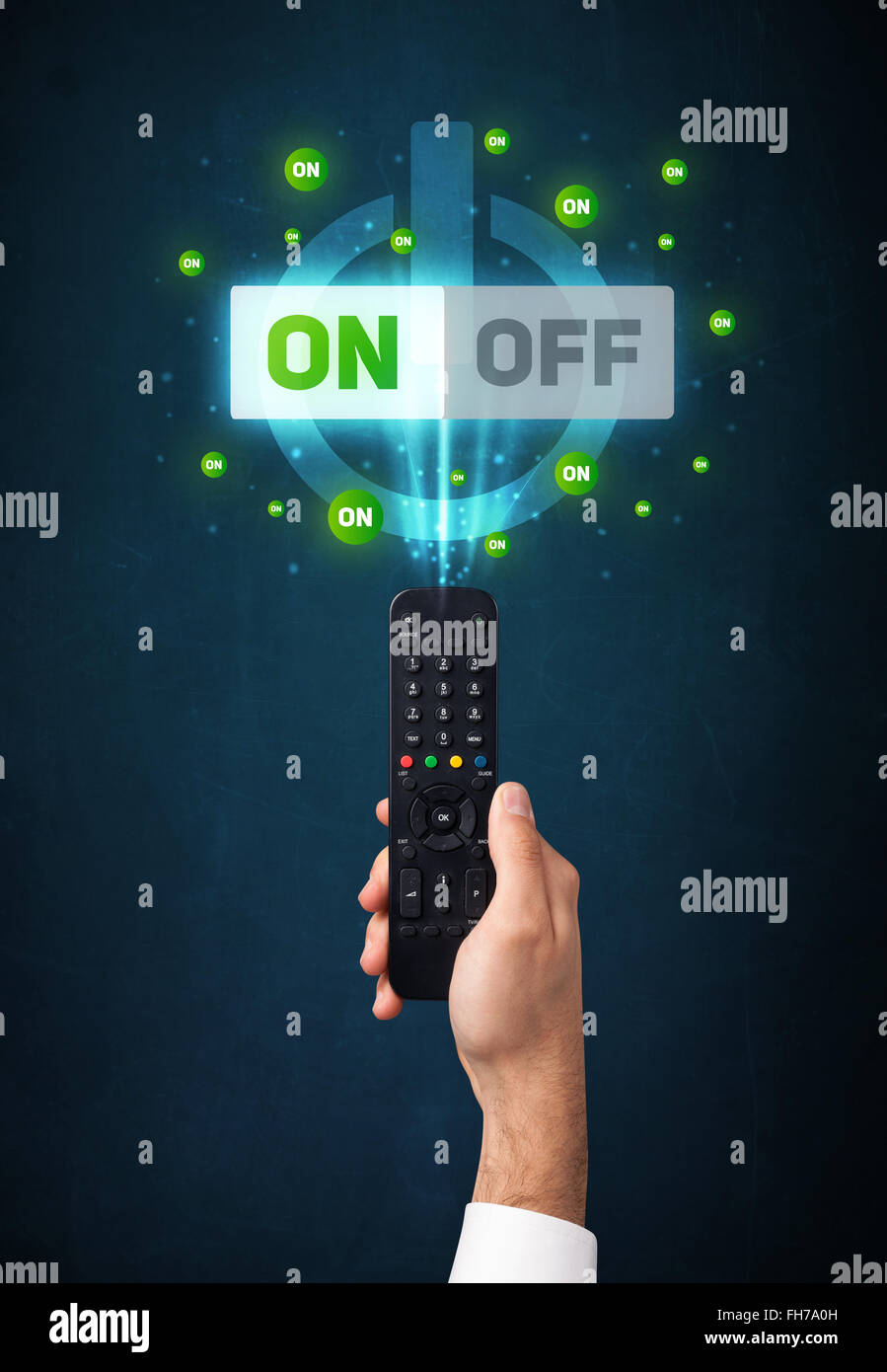 Hand with remote control and on-off signals Stock Photo - Alamy