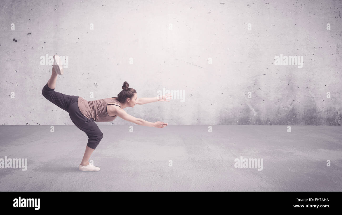 Pretty urban dancer with empty background Stock Photo - Alamy