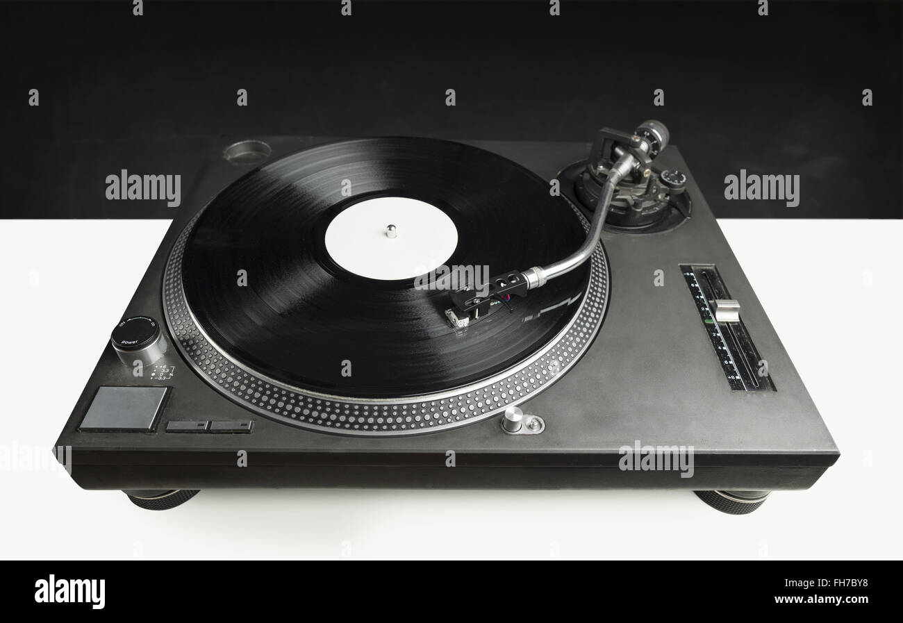 Turntable playing vinyl close up with needle on the record Stock Photo ...