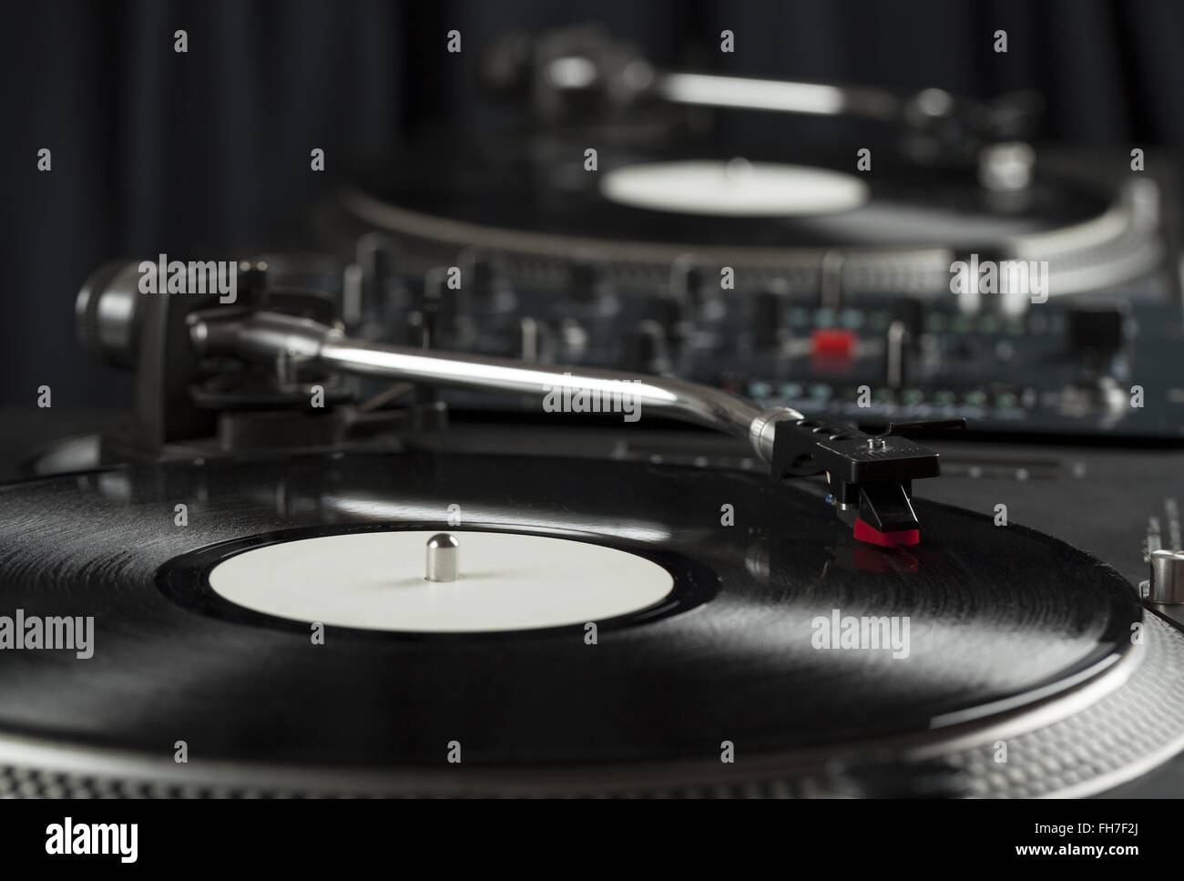 Turntable playing vinyl close up with needle on the record Stock Photo ...
