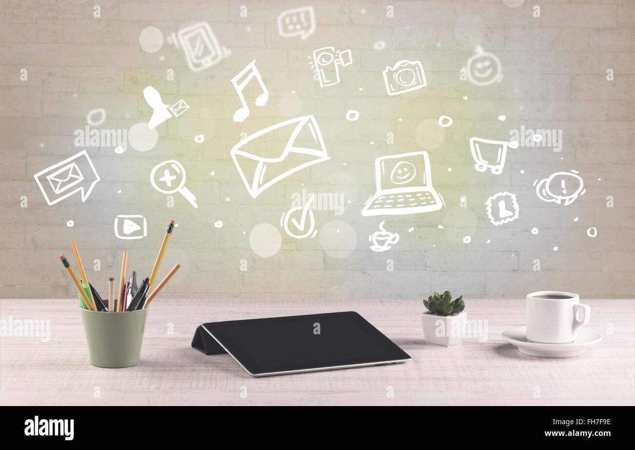 Office desk with communication icons Stock Photo - Alamy