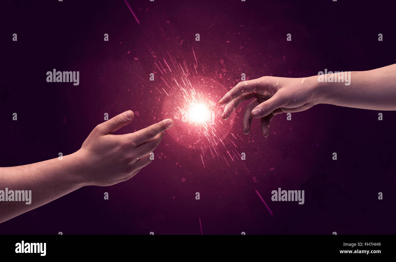 Touching hands light up sparkle in space Stock Photo