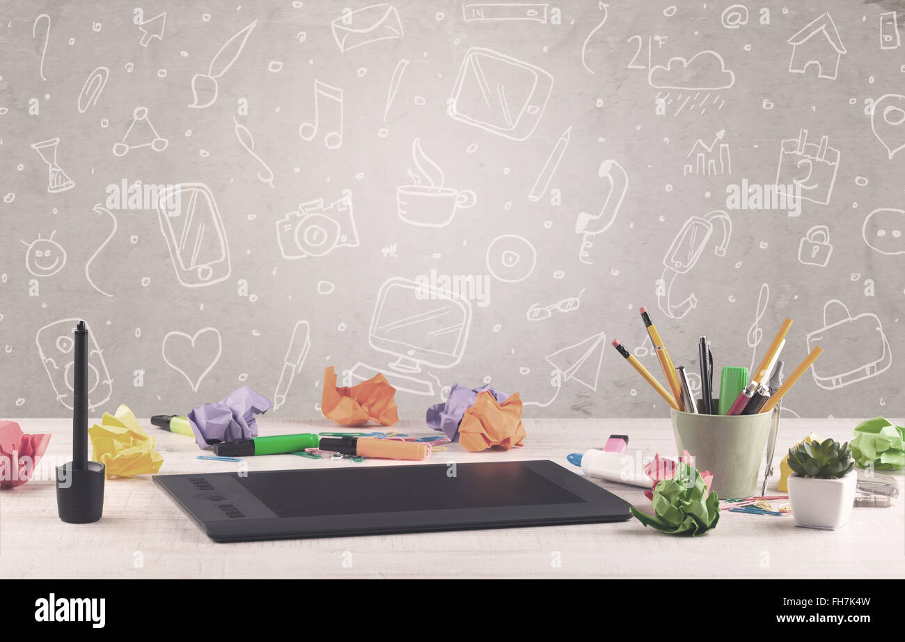 Design office desk with drawings background Stock Photo - Alamy