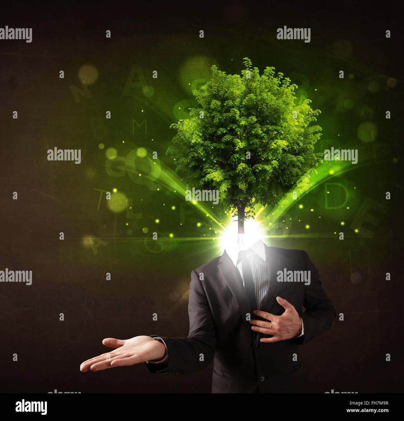 Man with green tree head concept Stock Photo - Alamy