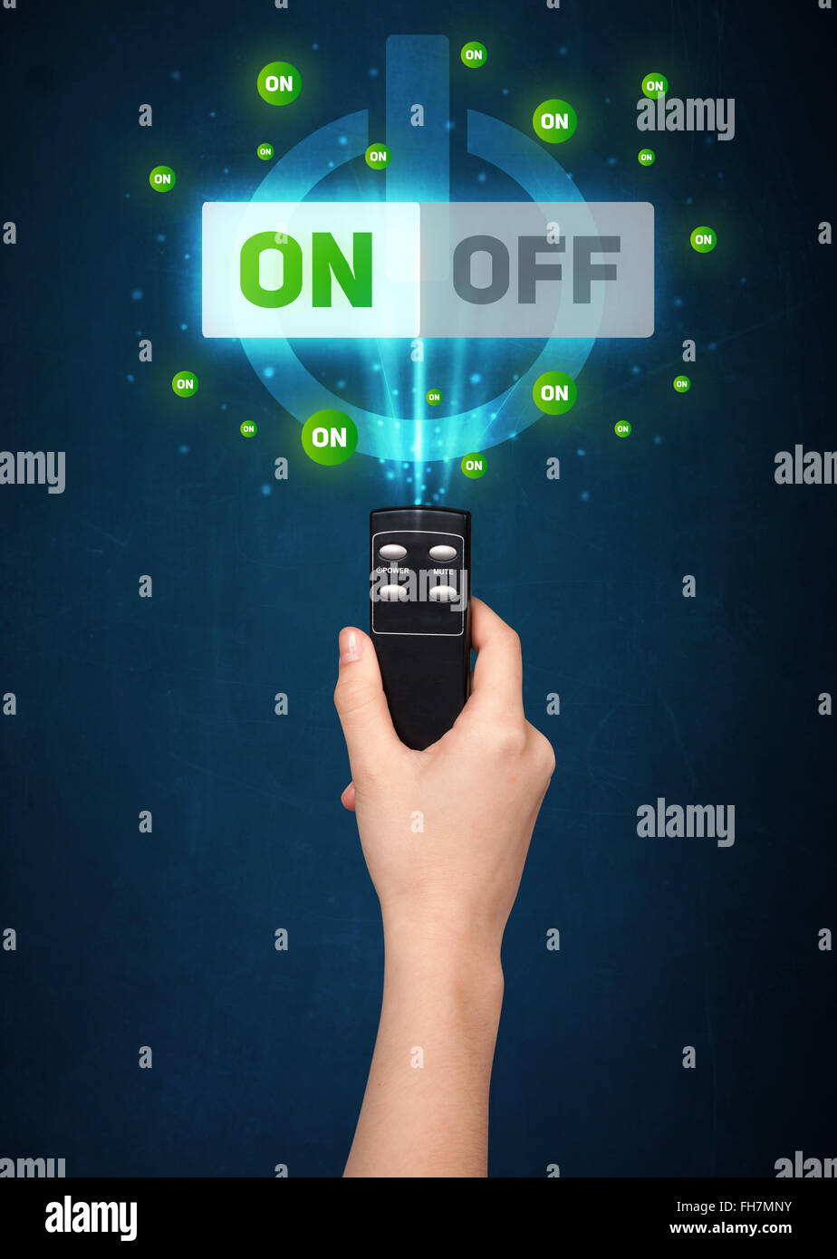 Hand with remote control and on-off signals Stock Photo - Alamy
