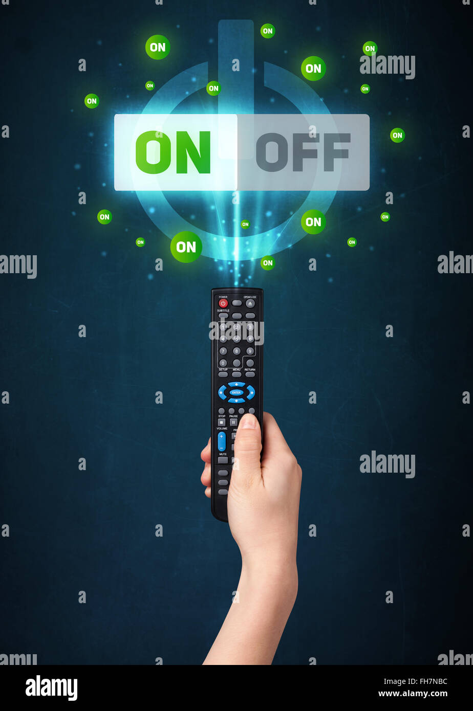 Hand with remote control and on-off signals Stock Photo - Alamy