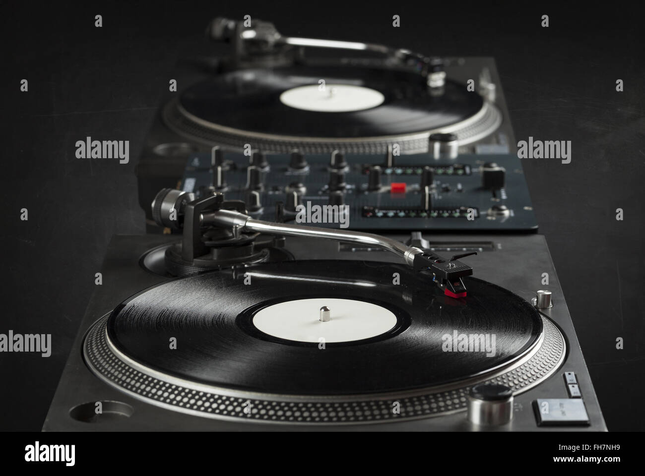 Turntable playing vinyl close up with needle on the record Stock Photo ...