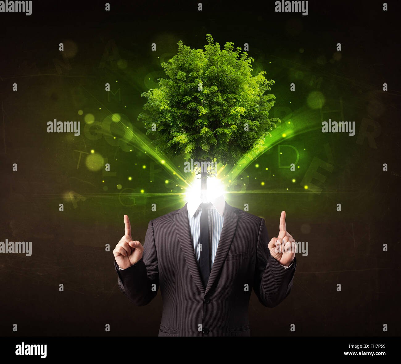 Man with green tree head concept Stock Photo