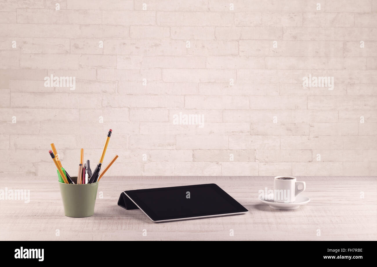 Office Desk Closeup With White Brick Wall Stock Photo 96673010