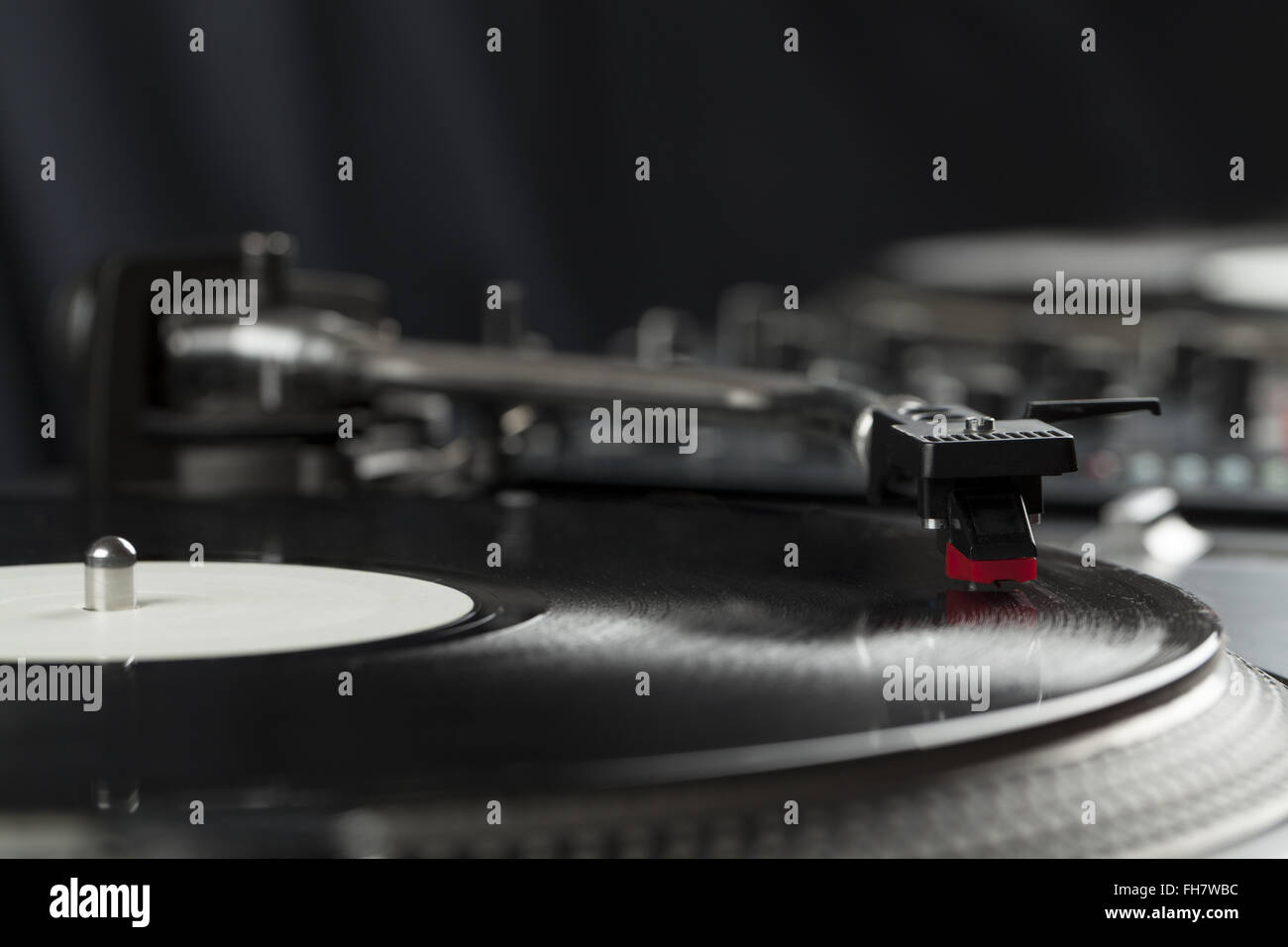 Turntable playing vinyl close up with needle on the record Stock Photo ...