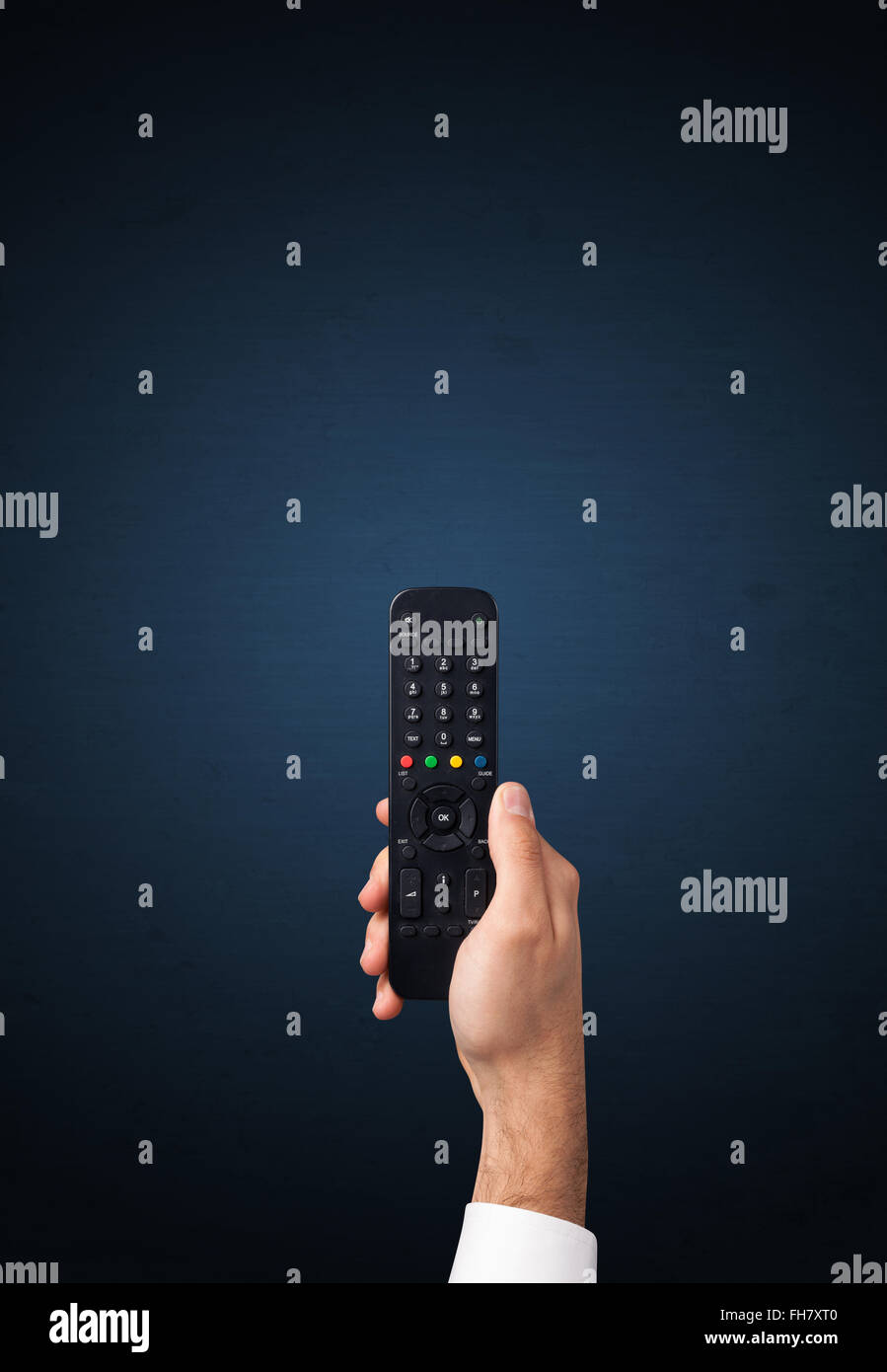 Hand Using Remote Control Hand with remote control Stock Photo - Alamy