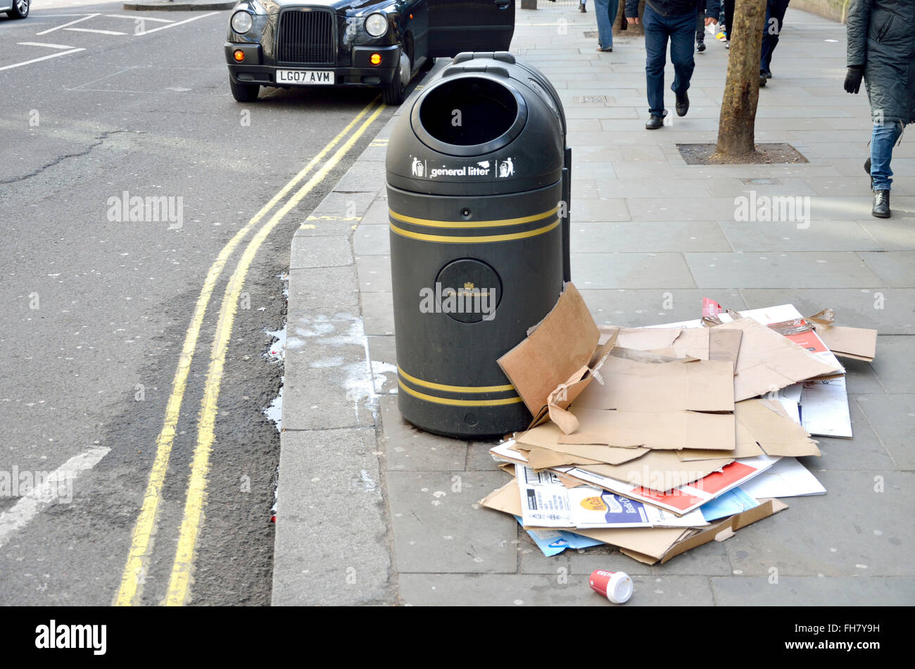 London, England, UK. Cardboard left by rubbish bins in central London