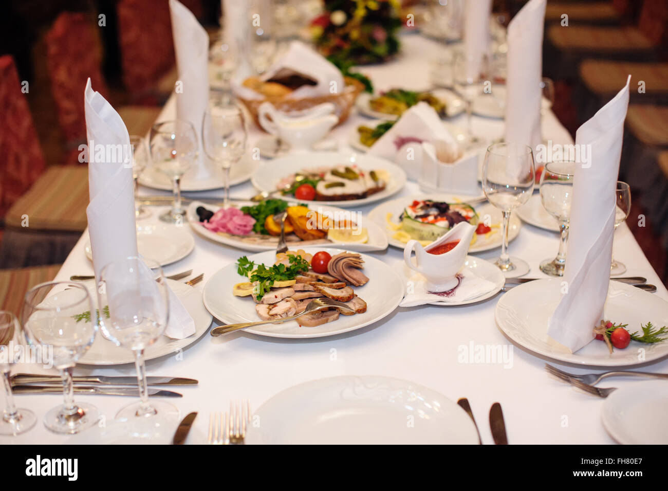 decorated table for a wedding dinner in the restaurant Stock Photo