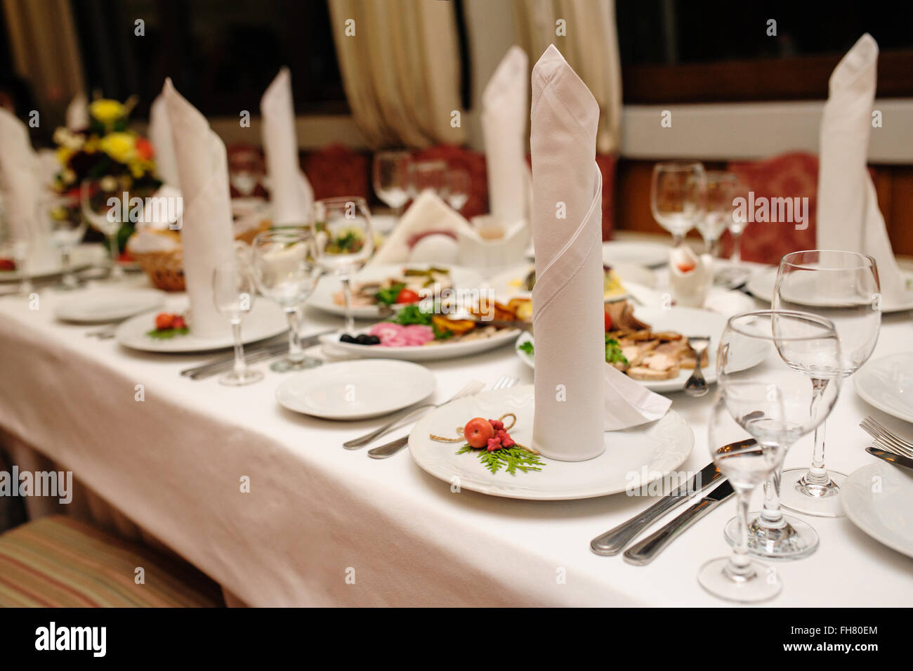 decorated table for a wedding dinner in the restaurant Stock Photo