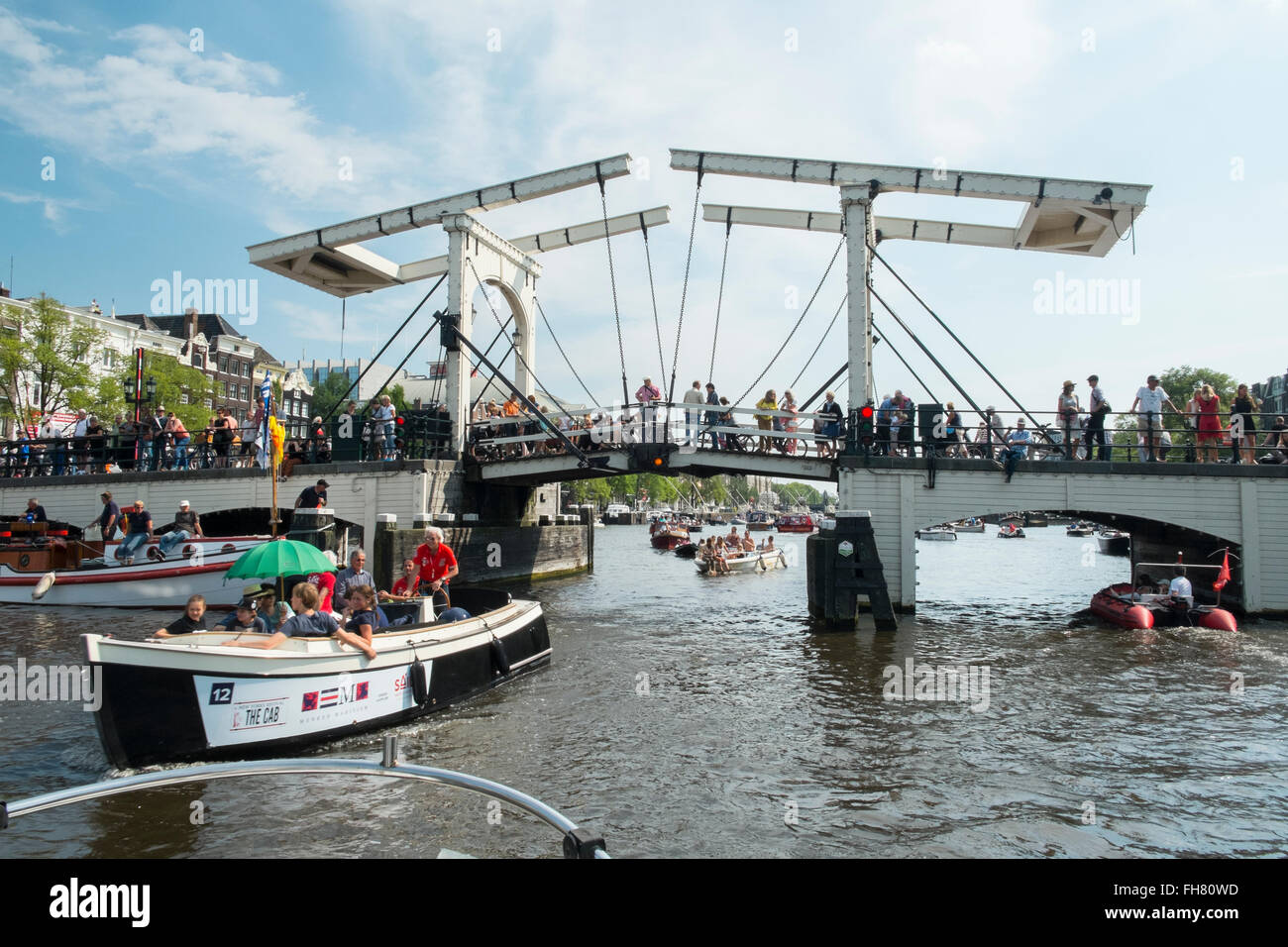 Magere Brug - Skinny bridge. Sail 2015. Amstel river, Amsterdam Stock Photo