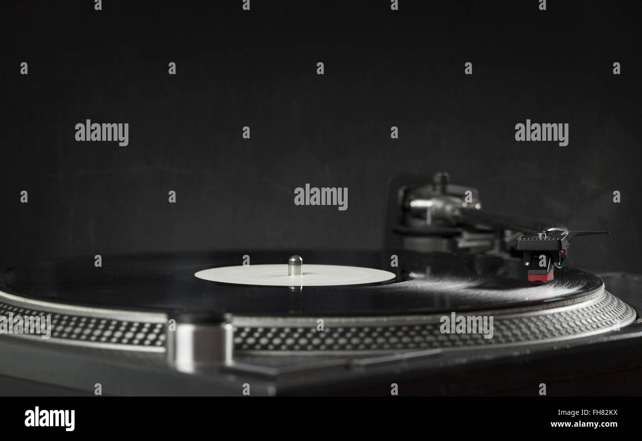 Turntable playing vinyl close up with needle on the record Stock Photo ...
