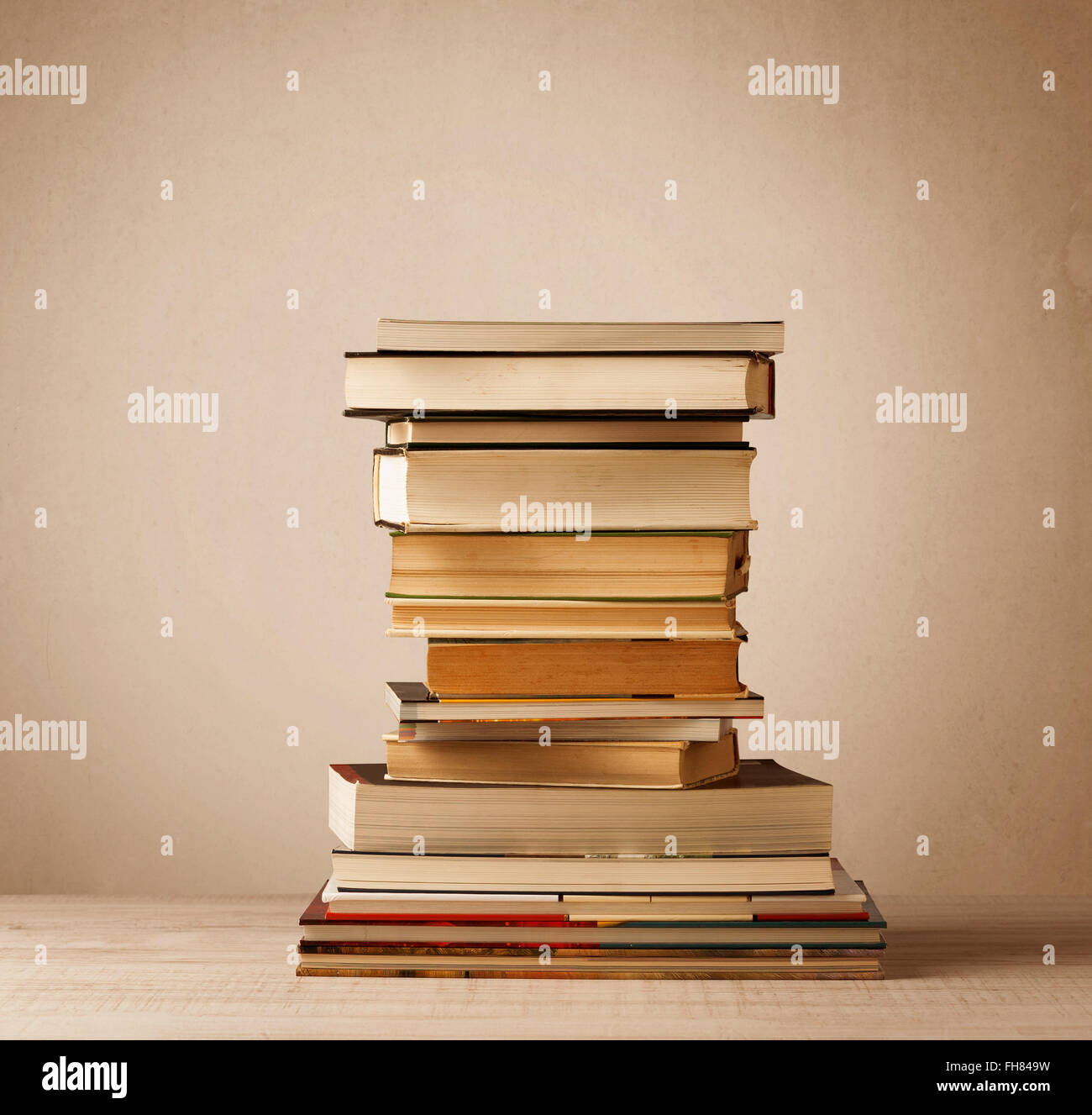 A stack of books with vintage background Stock Photo - Alamy