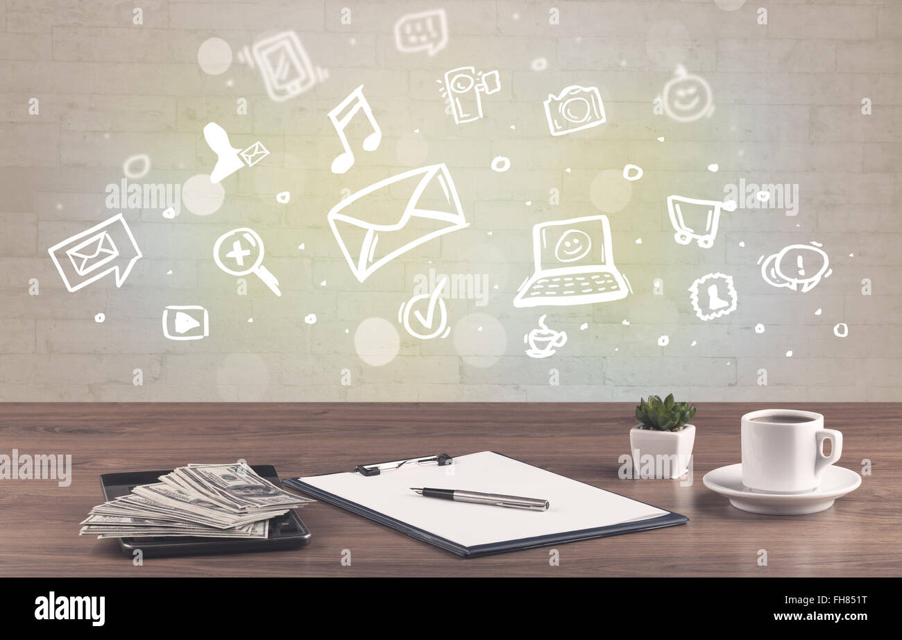 Office desk with communication icons Stock Photo - Alamy