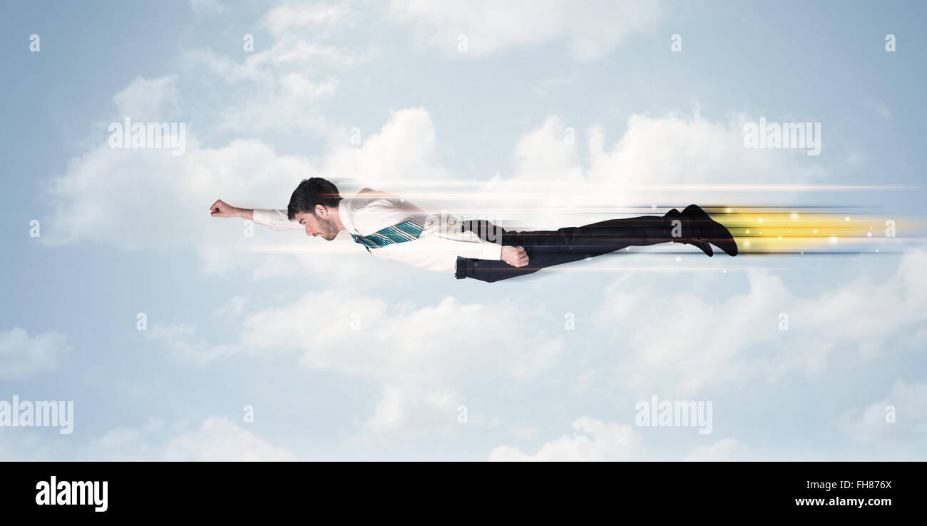 Happy business man flying fast on the sky between clouds Stock Photo ...