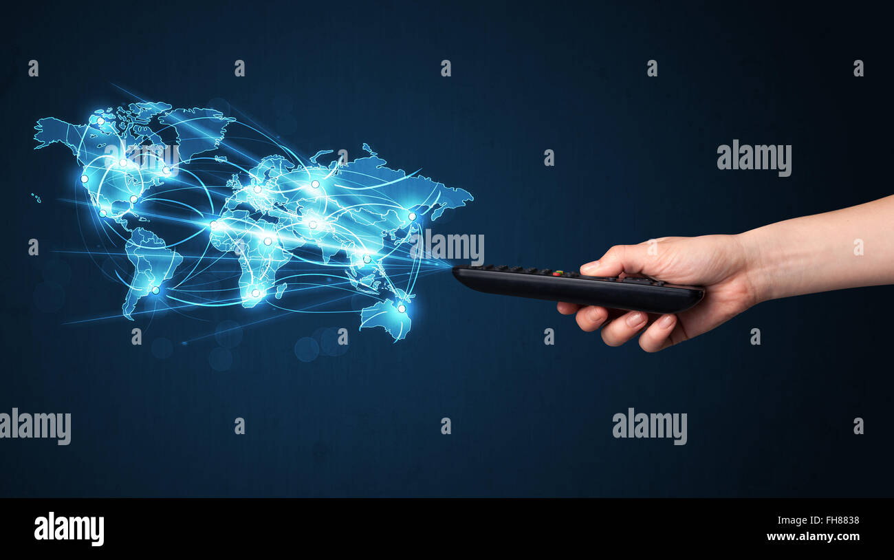 Hand with remote control, social media concept Stock Photo